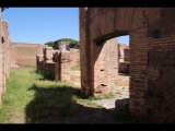 03198 ostia - regio i - insula xii - caseggiato dei triclini (i,xii,1) - hof - porticus - westseite - bli ri nordosten - 06-2024.jpg